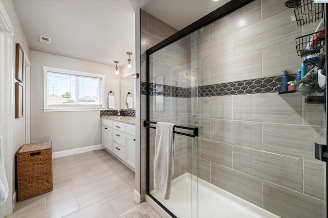 10389 W 17th Pl, Kennewick, WA 99338 - full bathroom with vanity and a stall shower
