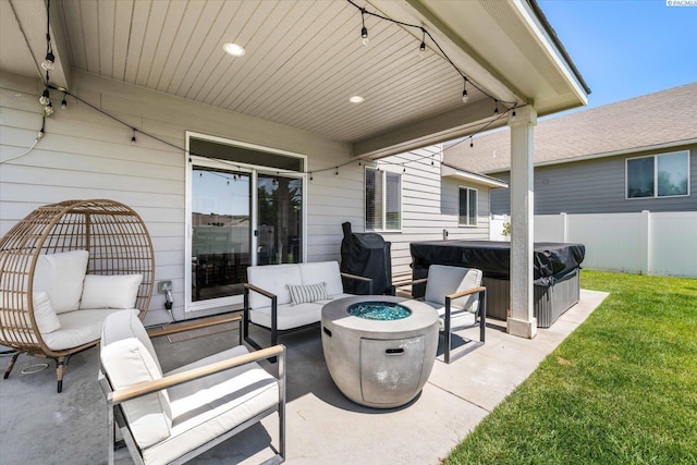10389 W 17th Pl, Kennewick, WA 99338 - view of patio / terrace featuring a hot tub and an outdoor living space with a fire pit