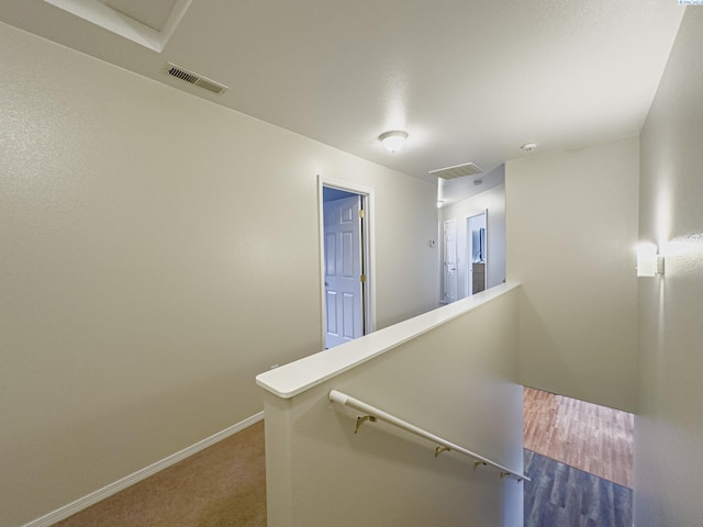 stairway with carpet flooring