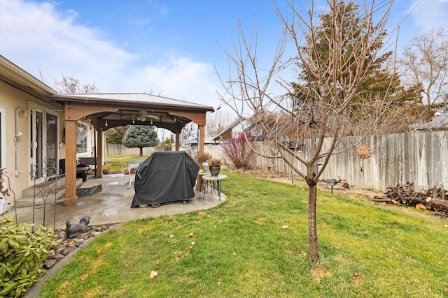 view of yard featuring a gazebo and a patio area