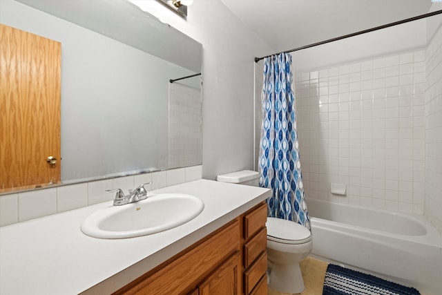 full bathroom featuring vanity, toilet, and shower / bath combo