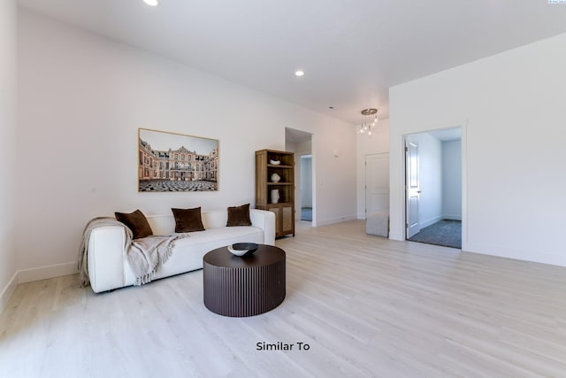 6905 Rd 108, Pasco, WA 99301 - living area featuring light wood finished floors, a chandelier, baseboards, and recessed lighting