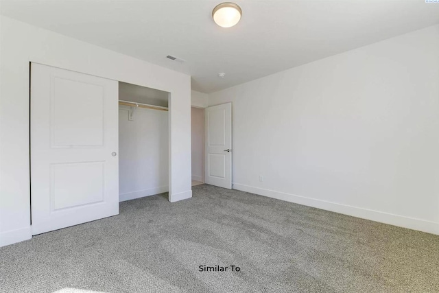 6905 Rd 108, Pasco, WA 99301 - unfurnished bedroom featuring carpet flooring, a closet, and baseboards