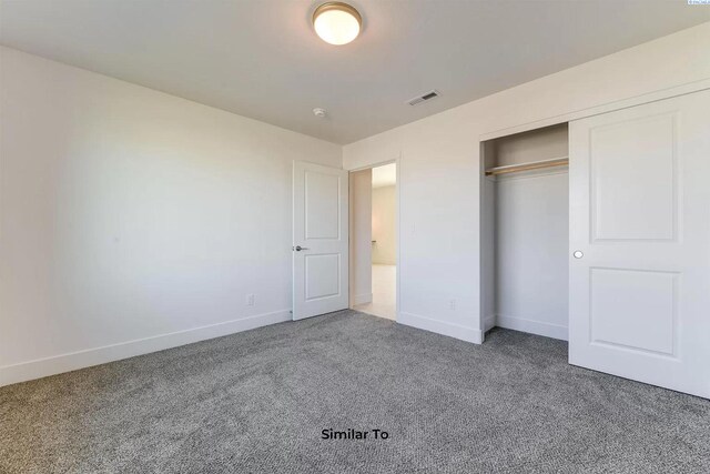 6905 Rd 108, Pasco, WA 99301 - unfurnished bedroom featuring carpet flooring, baseboards, and a closet
