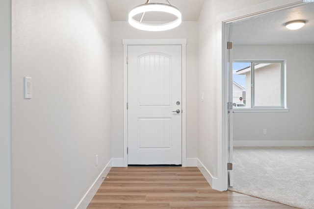 10409 Kokanee Dr, Pasco, WA 99301 - doorway featuring light wood-type flooring and baseboards