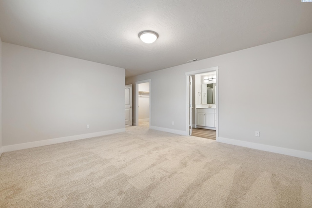 10409 Kokanee Dr, Pasco, WA 99301 - empty room with light carpet and baseboards