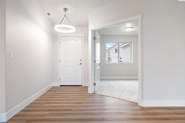 10409 Kokanee Dr, Pasco, WA 99301 - entryway with light wood-style floors and baseboards