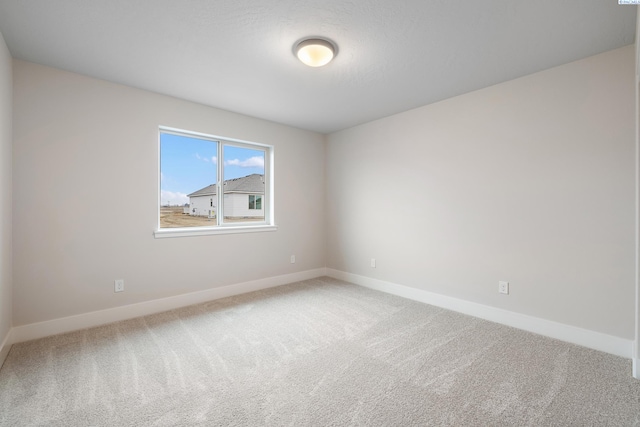 10409 Kokanee Dr, Pasco, WA 99301 - carpeted empty room featuring baseboards