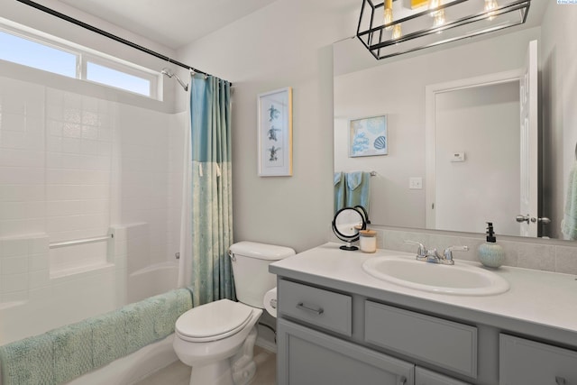 98702 E Brooklyn Dr, Kennewick, WA 99338 - full bathroom featuring vanity, toilet, shower / bathtub combination with curtain, and a chandelier