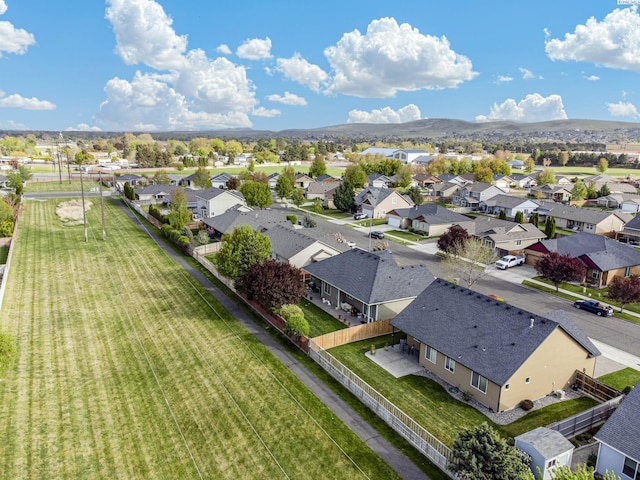 aerial view featuring a mountain view and a residential view