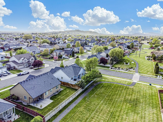 bird's eye view featuring a mountain view and a residential view