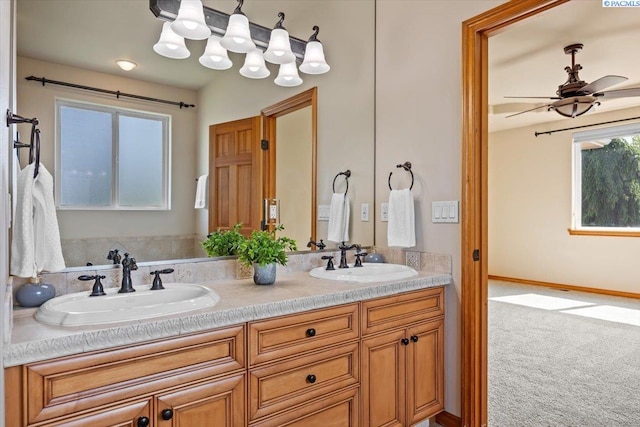 100 S Nevada St, Kennewick, WA 99336 - bathroom with double vanity and a ceiling fan