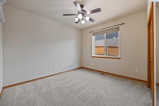 100 S Nevada St, Kennewick, WA 99336 - empty room with light colored carpet and a ceiling fan
