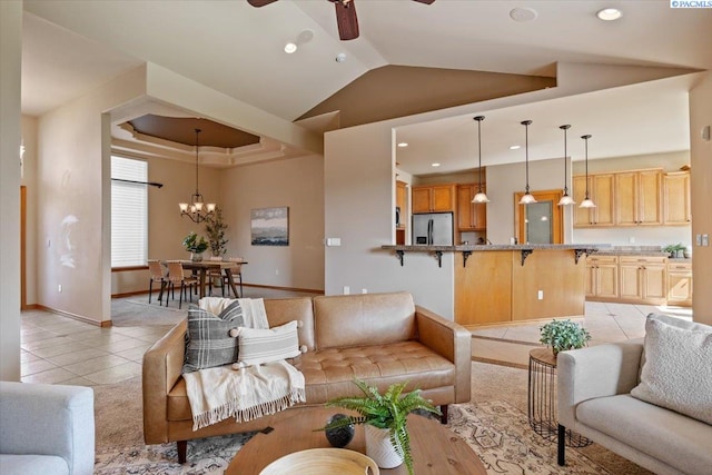 100 S Nevada St, Kennewick, WA 99336 - living room with light tile patterned flooring, recessed lighting, a ceiling fan, a chandelier, and lofted ceiling