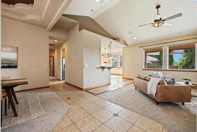 100 S Nevada St, Kennewick, WA 99336 - living room featuring light tile patterned floors, vaulted ceiling, a ceiling fan, recessed lighting, and light carpet