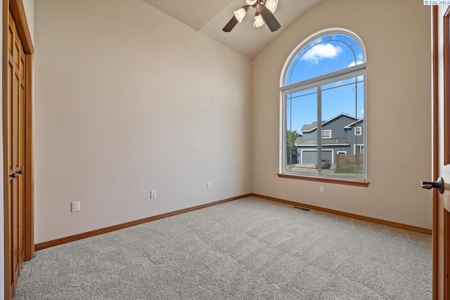 100 S Nevada St, Kennewick, WA 99336 - empty room with carpet flooring, a ceiling fan, and vaulted ceiling