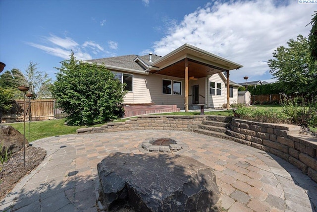 100 S Nevada St, Kennewick, WA 99336 - back of property featuring a patio and a fire pit