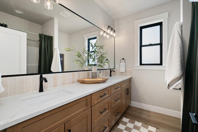 671 Cortona Way, Richland, WA 99352 - bathroom with wood finished floors and double vanity