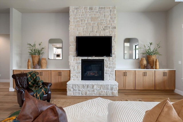 671 Cortona Way, Richland, WA 99352 - living room featuring light wood finished floors and a fireplace