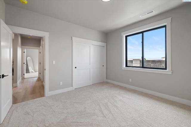 671 Cortona Way, Richland, WA 99352 - unfurnished bedroom featuring carpet flooring and a closet