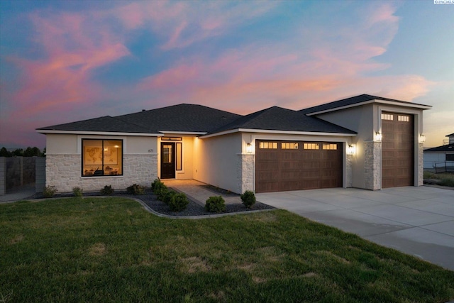 671 Cortona Way, Richland, WA 99352 - prairie-style home featuring stone siding, stucco siding, a garage, and concrete driveway