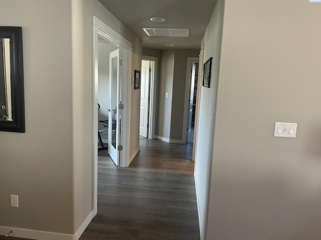 230 Ladera St, Prosser, WA 99350 - corridor featuring dark wood-type flooring, visible vents, and baseboards