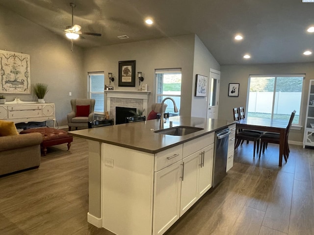 230 Ladera St, Prosser, WA 99350 - kitchen featuring dishwasher, a sink, open floor plan, dark wood finished floors, and a fireplace