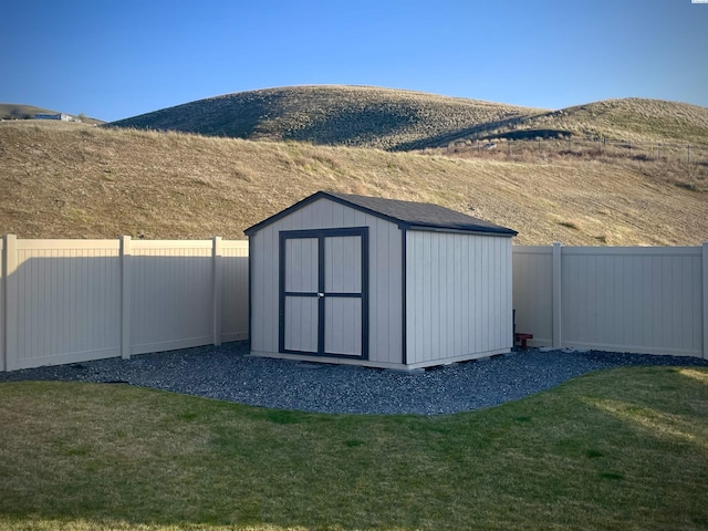 230 Ladera St, Prosser, WA 99350 - view of shed featuring a fenced backyard and a mountain view
