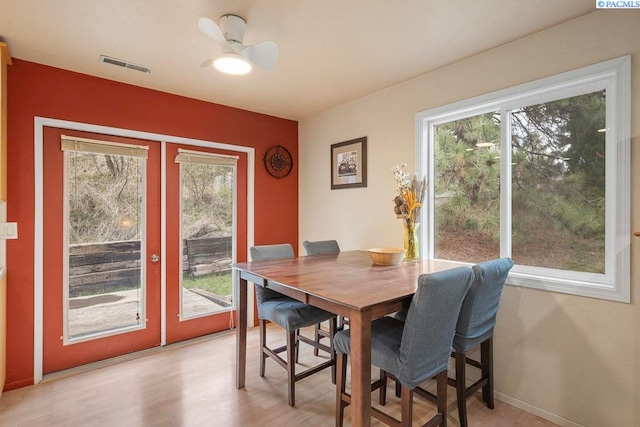 320 SW Kimball Dr, Pullman, WA 99163 - dining room featuring plenty of natural light, light wood finished floors, french doors, and ceiling fan