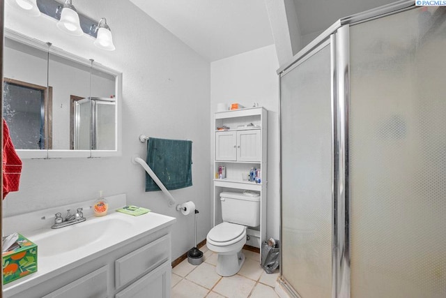 320 SW Kimball Dr, Pullman, WA 99163 - bathroom with a stall shower, toilet, tile patterned floors, and vanity