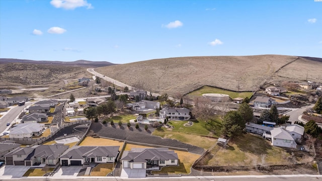 aerial view featuring a residential view and a mountain view