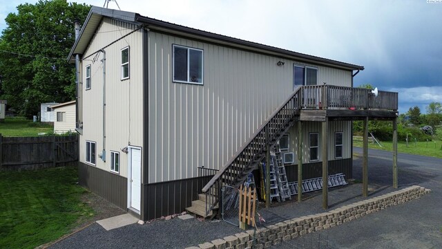 420 E Houghton St, Palouse, WA 99161 - view of side of home featuring stairs, a deck, and fence