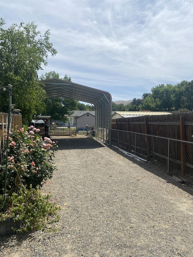 1026 Hemlock St, Prosser, WA 99350 - view of yard with a carport and driveway
