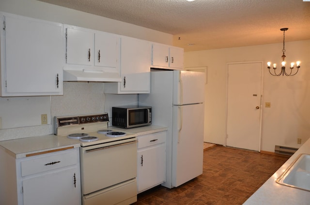 1026 Hemlock St, Prosser, WA 99350 - kitchen featuring white appliances, under cabinet range hood, light countertops, white cabinets, and a textured ceiling