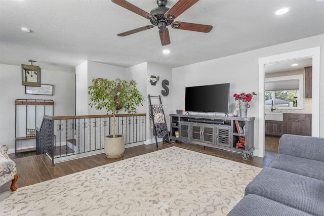 7816 W Argent Rd, Pasco, WA 99301 - living room featuring sink, dark wood-type flooring, and ceiling fan