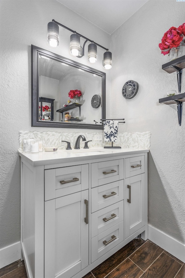 7816 W Argent Rd, Pasco, WA 99301 - bathroom featuring wood-type flooring and vanity