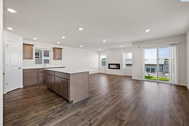 691 S Zeelar St, Kennewick, WA 99336 - kitchen featuring dark wood finished floors, a center island, light countertops, recessed lighting, and open floor plan