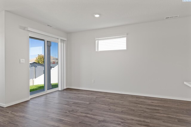 691 S Zeelar St, Kennewick, WA 99336 - spare room featuring healthy amount of natural light, dark wood-style flooring, baseboards, and recessed lighting