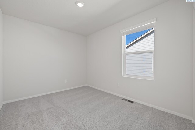 691 S Zeelar St, Kennewick, WA 99336 - carpeted spare room featuring baseboards