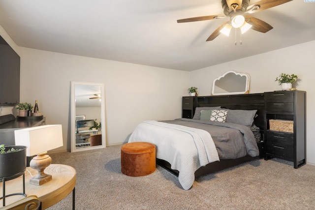 carpeted bedroom with a ceiling fan