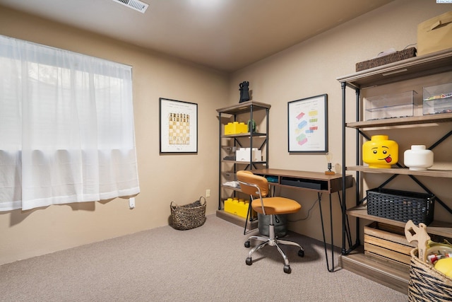 carpeted home office with visible vents