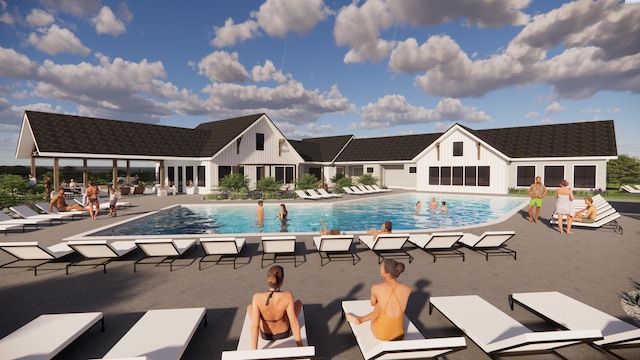 view of swimming pool with a patio area