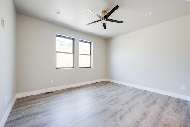 590 SW Cayuse St, Pullman, WA 99163 - spare room featuring a ceiling fan, visible vents, wood finished floors, and recessed lighting