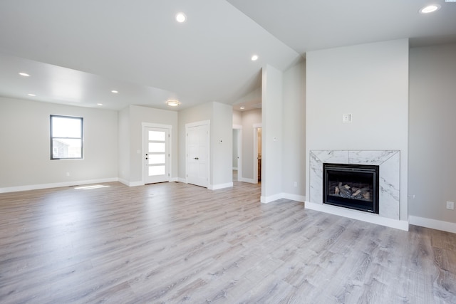 590 SW Cayuse St, Pullman, WA 99163 - kitchen with open floor plan, a center island, stainless steel microwave, a sink, and backsplash