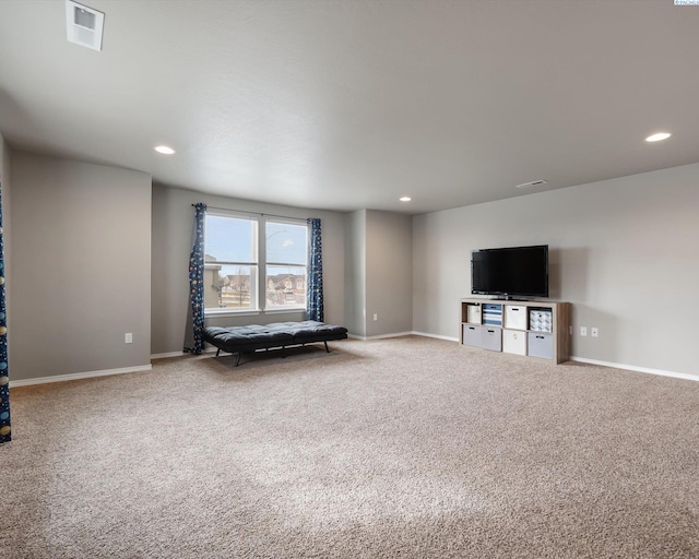 unfurnished room with carpet floors, recessed lighting, visible vents, and baseboards