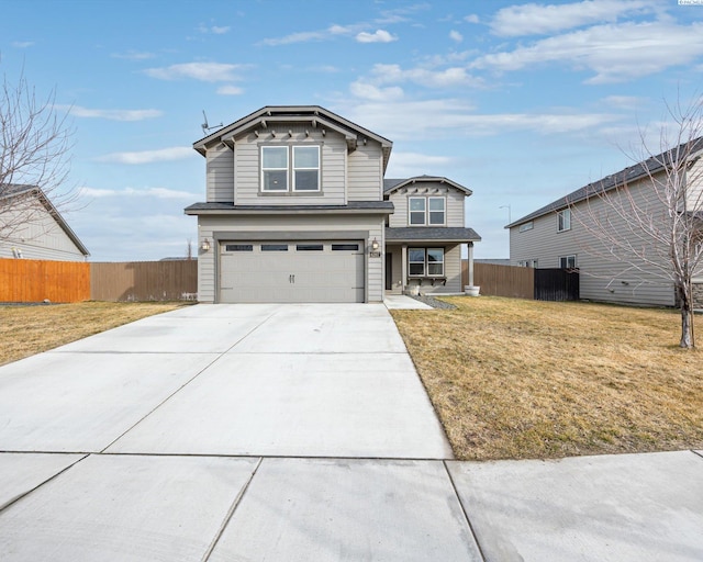 view of front of house with a garage, concrete driveway, fence, and a front lawn