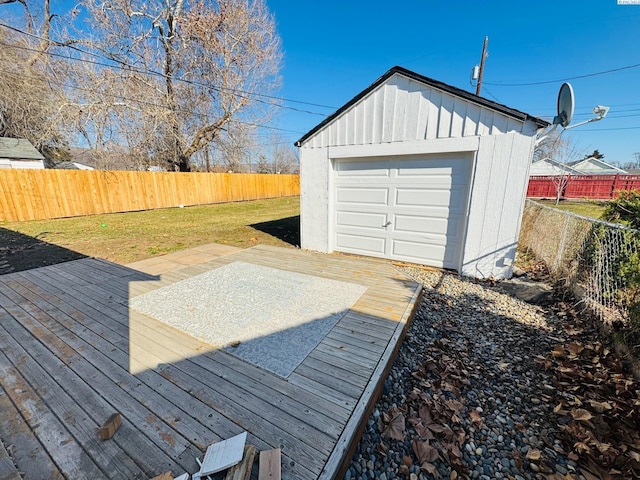 exterior space featuring a fenced backyard and an outdoor structure