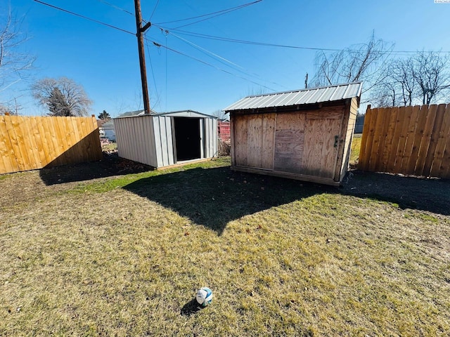 view of shed featuring fence