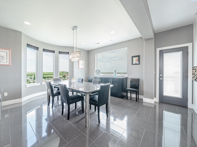 5880 S 58th Ave, West Richland, WA 99353 - dining area with granite floors, a chandelier, and recessed lighting