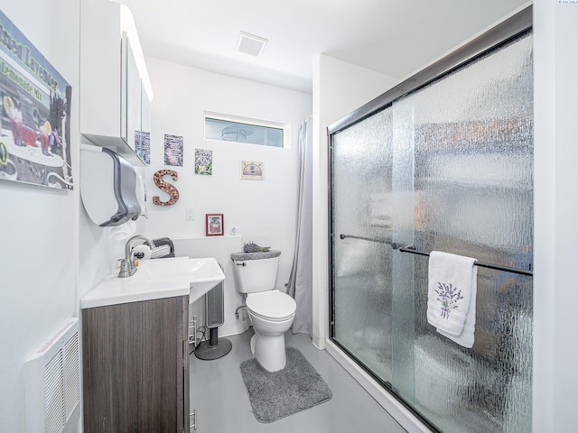 5880 S 58th Ave, West Richland, WA 99353 - full bath with an enclosed shower, vanity, and concrete floors